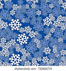 Seamless pattern. Snowflakes are arranged in random order.