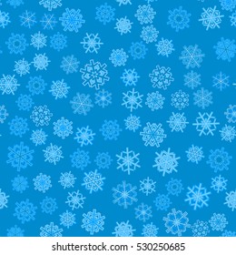 Seamless pattern of snowflakes. Blue background.