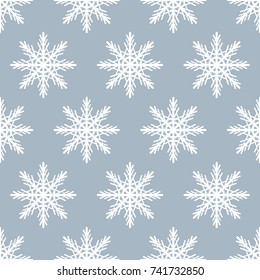 Seamless pattern of snowflakes. Christmas ornament.