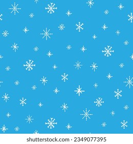 Patrón sin foco de copos de nieve. Cuidados elementos de Navidad coloridos al estilo de doodle. Ideal para el diseño, tarjeta de bienvenida, decoración, envoltura, textil. Dibujado a mano. Ilustración vectorial. Aislado en azul