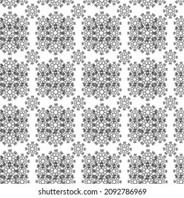 Patrón sin foco de copos de nieve con estilo de garabato, blanco y negro. Decoración de invierno para Navidad y Año Nuevo. Diseño de textiles, papel de envoltura, tarjetas, carteles. Ilustración lineal vectorial.