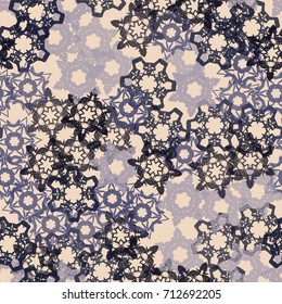 Seamless pattern. Snowflakes forming a chaotic pattern of glamorous camouflage. The picture is intended for clothing and a background for celebrating the identity.