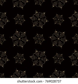 Seamless pattern of snowflakes. Golden snowflakes on dark background.