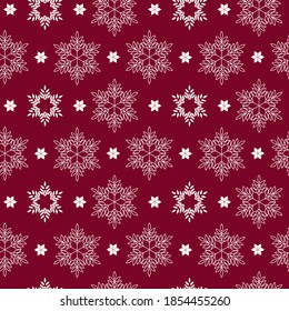 Seamless pattern with snowflakes. New year vector texture on a red background.  Design for packaging, textile, gift card.