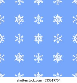 Seamless pattern snowflakes on a beautiful blue background