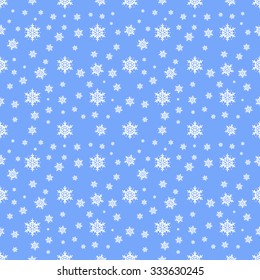 Seamless pattern snowflakes on a beautiful blue background