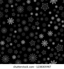 Seamless pattern of snowflakes on a black background