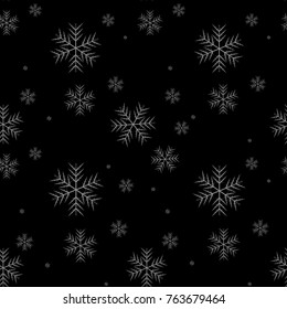 Seamless pattern of snowflakes on a black background