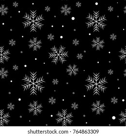 Seamless pattern of snowflakes on a blackbackground