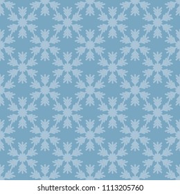 Seamless pattern with snowflakes on blue