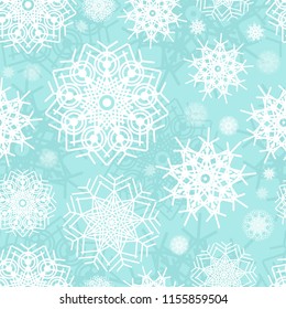 Seamless pattern of snowflakes on a blue background