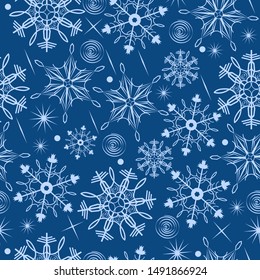 Seamless pattern with snowflakes on a blue background. Vector graphics.