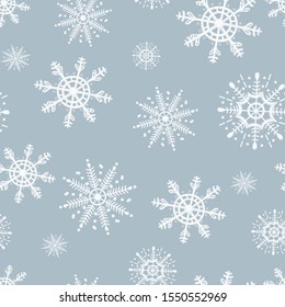 seamless pattern with snowflakes on a blue background 