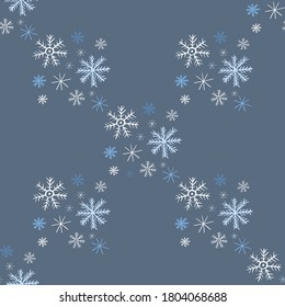 Seamless pattern with snowflakes on blue background for winter and christmas design