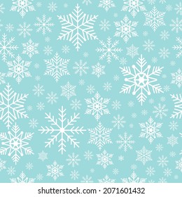 Seamless pattern of snowflakes on a blue background. Vector illustration