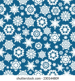 Seamless pattern with snowflakes on a blue background