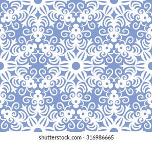 Seamless pattern with snowflakes on a blue background. Vector  illustration