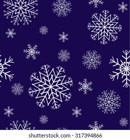 seamless pattern with snowflakes on blue