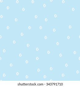 Seamless pattern with snowflakes on blue background.