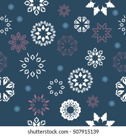 Seamless pattern of snowflakes on a blue background