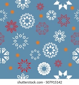 Seamless pattern of snowflakes on a blue background
