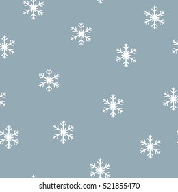 Seamless pattern of snowflakes on a blue background. Snowflakes seamless