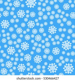 Seamless pattern of snowflakes on a blue background.