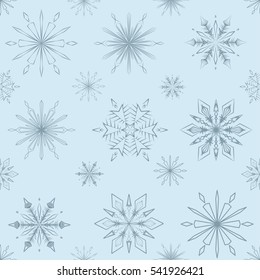 Seamless  pattern of  snowflakes on a blue background