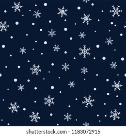 Seamless pattern - snowflakes on a dark background.