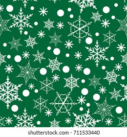 Seamless pattern of snowflakes on a Green background, Vector Illustration