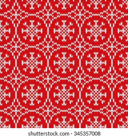 Seamless pattern from snowflakes on a knitted texture