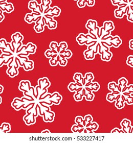 Seamless pattern with snowflakes on red