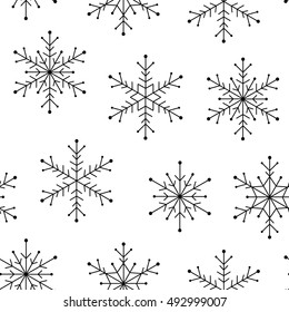 Seamless pattern with snowflakes ornate