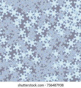 Seamless pattern. Snowflakes are scattered in disorder. New Year's background.