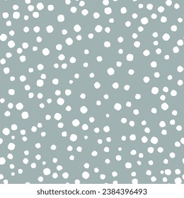 Seamless pattern with snowflakes, small circles, dots. Abstract falling snow. Vector simple graphics.