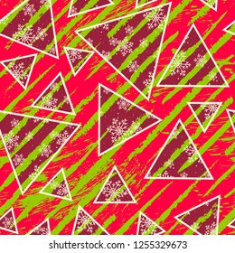 Seamless pattern of snowflakes in triangles. Art Christmas ornament. Grunge stripes on background.