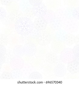 Seamless pattern. Snowflakes in white and blue shades.