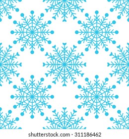 Seamless pattern with snowflakes. Winter background for wrapping paper, textile or cards. Christmas vector pattern.
