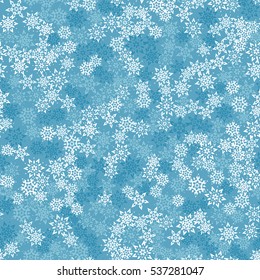 Seamless pattern of snowflakes. Winter camouflage.