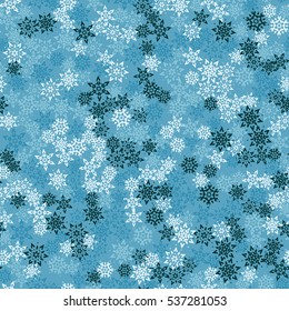 Seamless pattern of snowflakes. Winter camouflage.