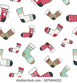 Seamless pattern with socks with dots and stripes and different colors. Winter trendy background of clothing items, gift wrap, postcards. Red, green and gold