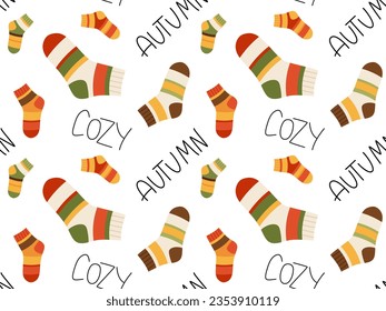 Seamless pattern of socks and handwritten cozy. Vector illustration