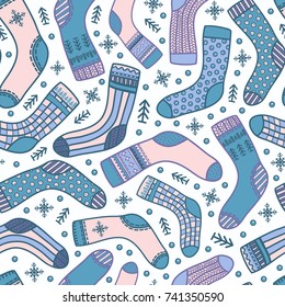 seamless pattern with socks with snowflakes and fir-trees