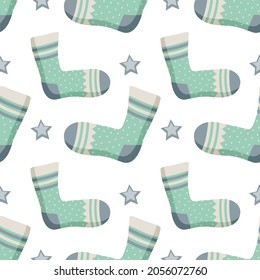 Seamless pattern with socks, stars and different print. Winter trendy background of clothing items, gift wrapping, postcards for Christmas or New year