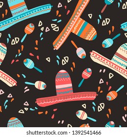 Seamless pattern with sombrero hat, maracas and decorative elements. Mexican children mood. Vector illustration.