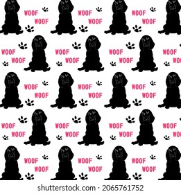 A seamless pattern with spaniel dogs and paws, vector illustration, eps 10