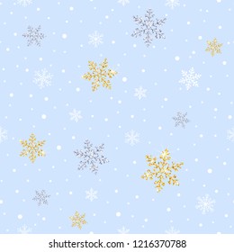 seamless pattern with sparkling gold and silver snowflakes on a light background