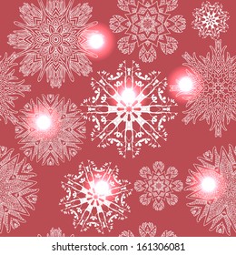 Seamless pattern sparkling ornate snowflakes on a red background