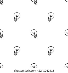 Seamless pattern with sparsely spaced, slightly tilted hand drawn small light bulbs.