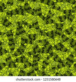 Seamless pattern. Speckled green leaves are randomly arranged against wavy lines. Camouflage style.